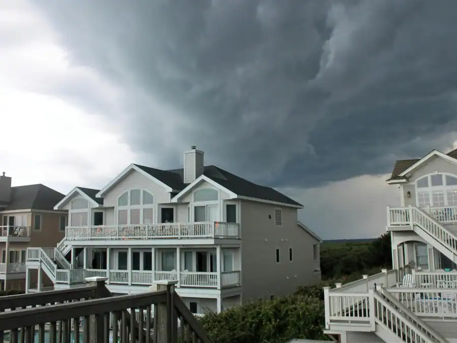 Houses with a storm nearby